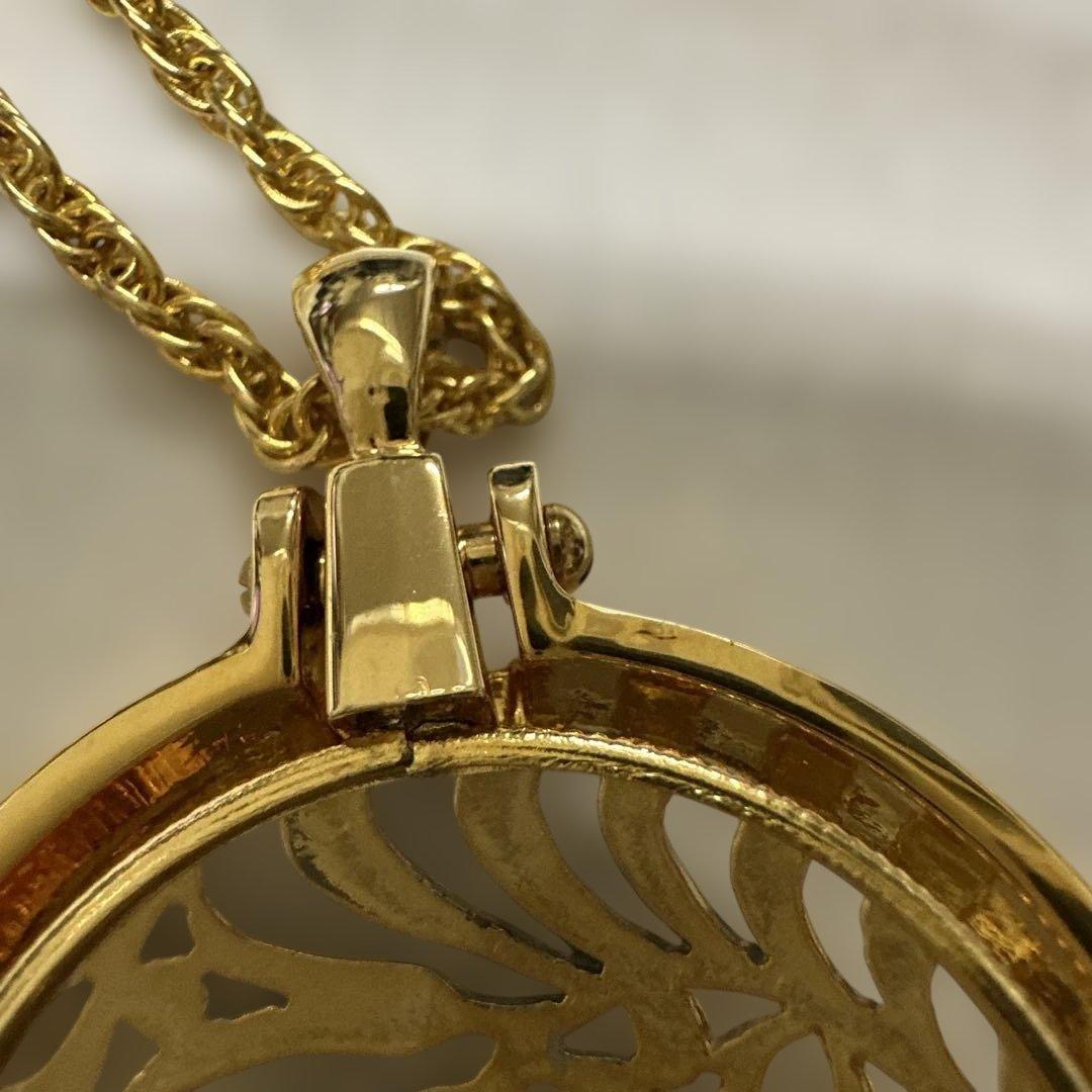 Mikimoto Pearl Loupe Necklace featuring a real pearl pendant on a delicate chain in used condition