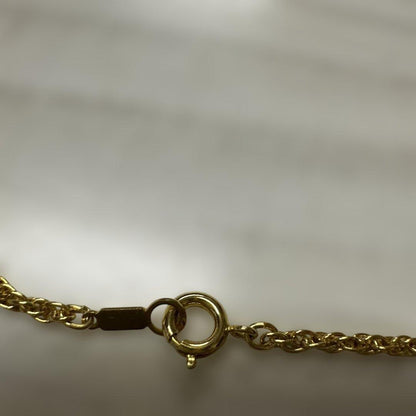 Mikimoto Pearl Loupe Necklace featuring a real pearl pendant on a delicate chain in used condition