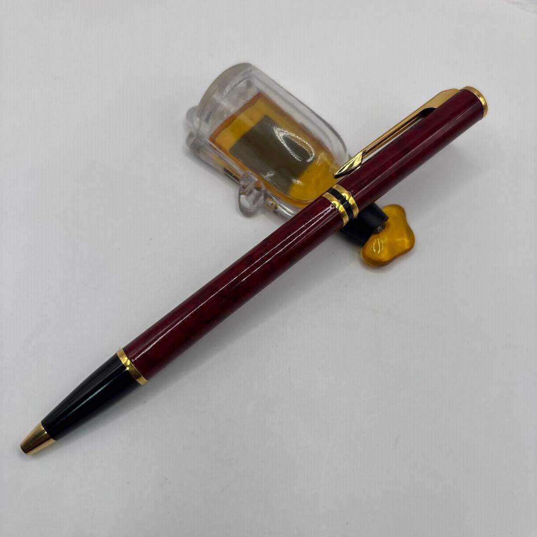 Waterman Laureat twist ballpoint pen in Bordeaux Red Marble with plastic body, used condition