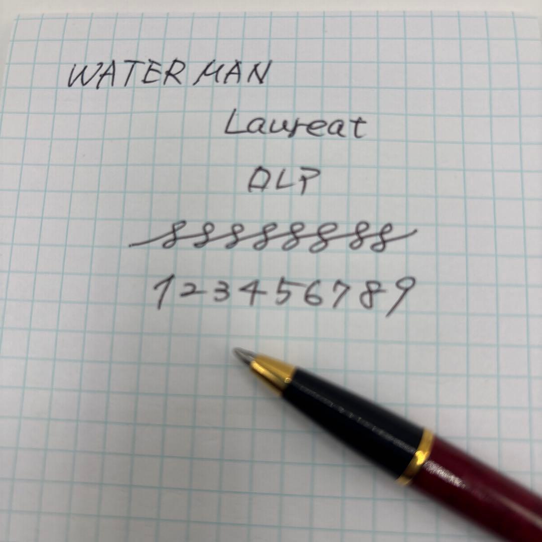 Waterman Laureat twist ballpoint pen in Bordeaux Red Marble with plastic body, used condition