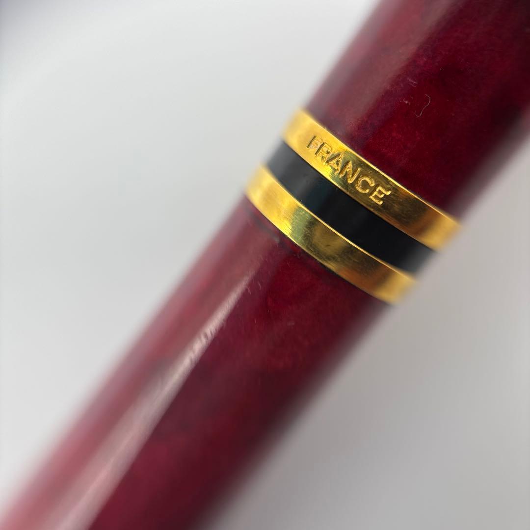 Waterman Laureat twist ballpoint pen in Bordeaux Red Marble with plastic body, used condition