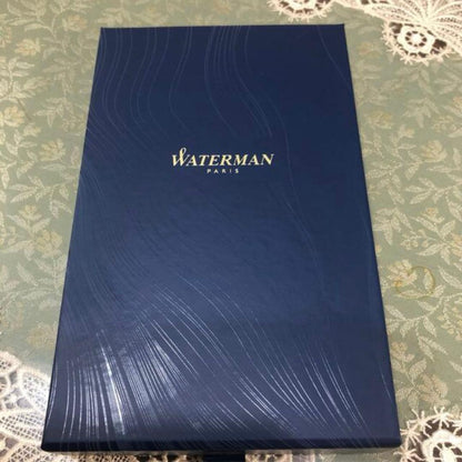 Waterman pink ballpoint pen with a brown leather case and original packaging box