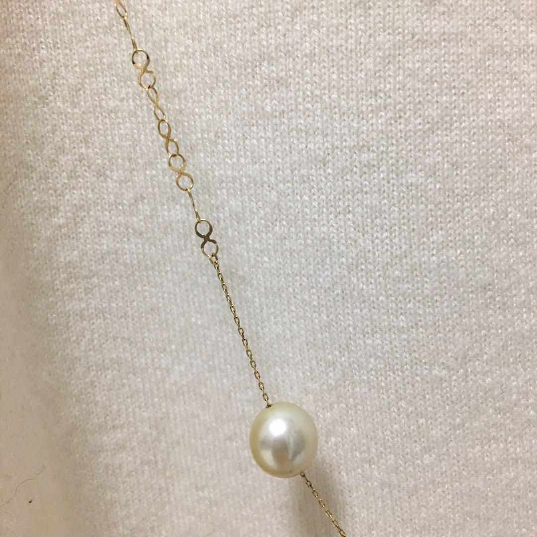 Jewelry Tsutsumi South Sea white butterfly pearl necklace with 12.5mm pearls on a white background