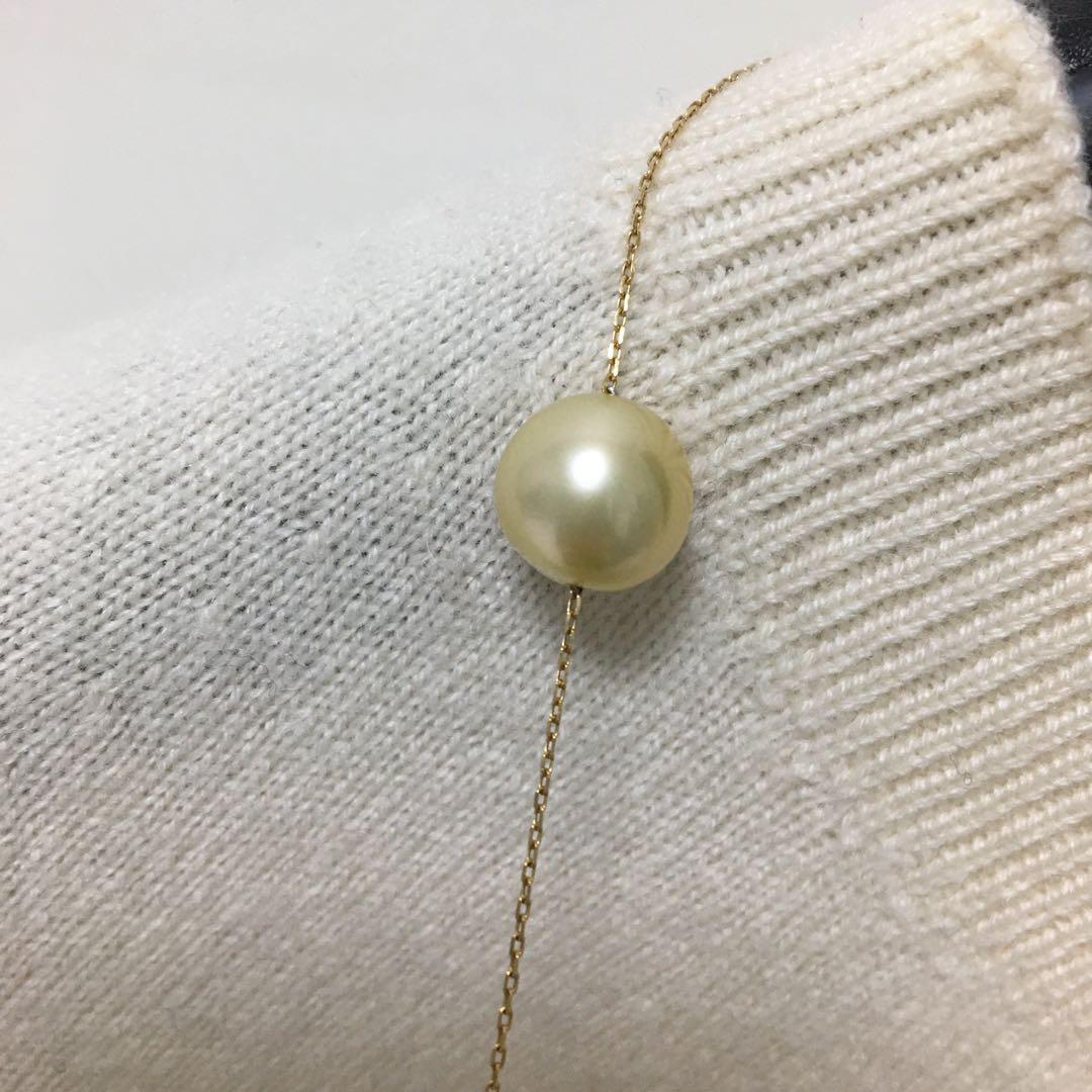 Jewelry Tsutsumi South Sea white butterfly pearl necklace with 12.5mm pearls on a white background