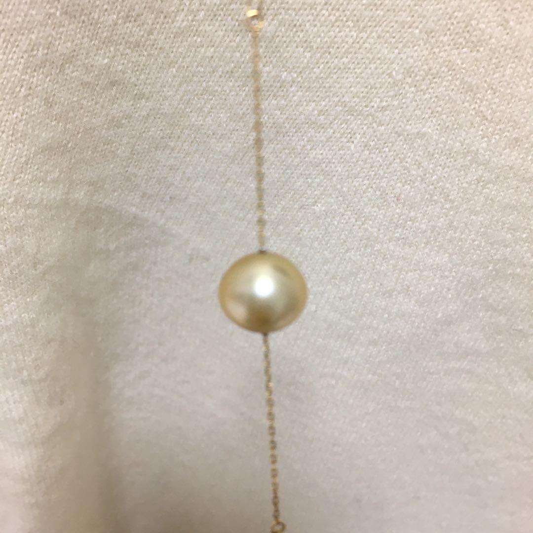Jewelry Tsutsumi South Sea white butterfly pearl necklace with 12.5mm pearls on a white background