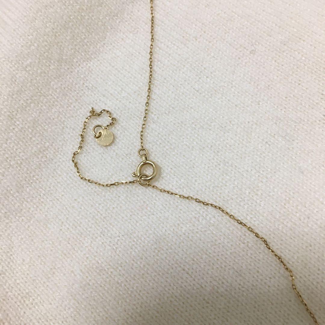 Jewelry Tsutsumi South Sea white butterfly pearl necklace with 12.5mm pearls on a white background