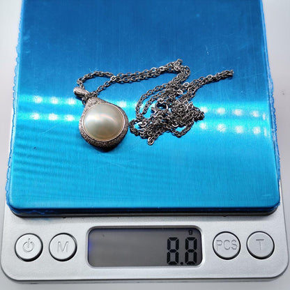 TASAKI Mabe Pearl Necklace with large 15mm iridescent pearl on silver chain