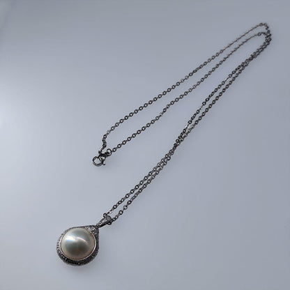 TASAKI Mabe Pearl Necklace with large 15mm iridescent pearl on silver chain