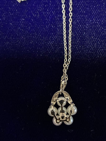 MIKIMOTO Baby Pearl Necklace featuring 6 pearls and a flower-arrange pendant on a 40cm chain