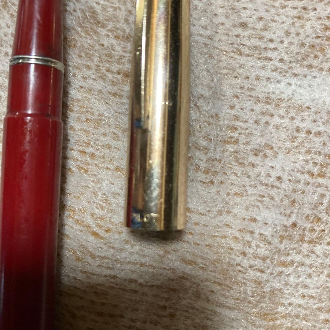 Vintage 14k PILOT SUPER100s fountain pen with gold cap and Bordeaux barrel showing inset nib