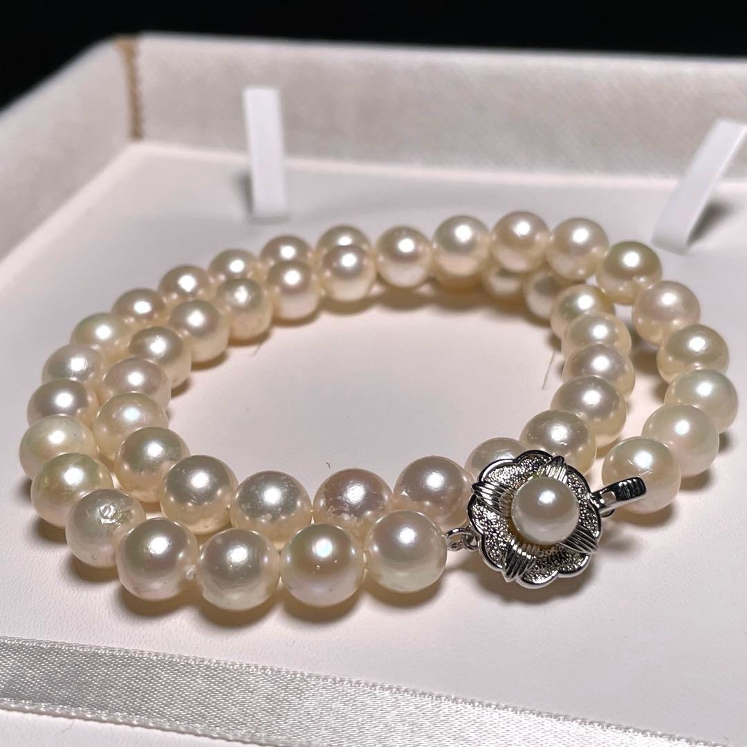 Akoya pearl necklace featuring round white pearls sized 8.5 to 8.8 mm on a 17-inch silver chain