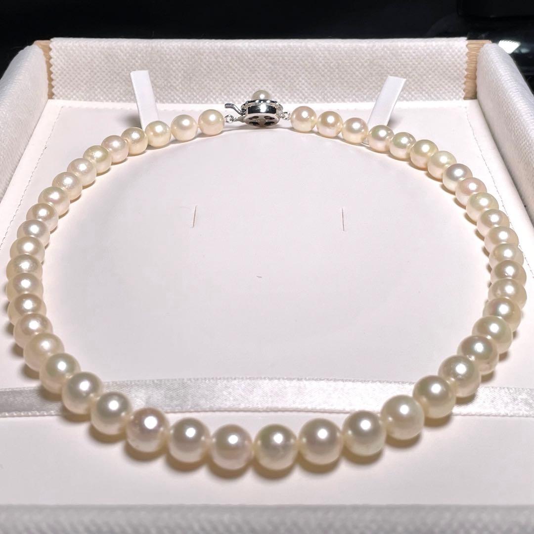 Akoya pearl necklace featuring round white pearls sized 8.5 to 8.8 mm on a 17-inch silver chain