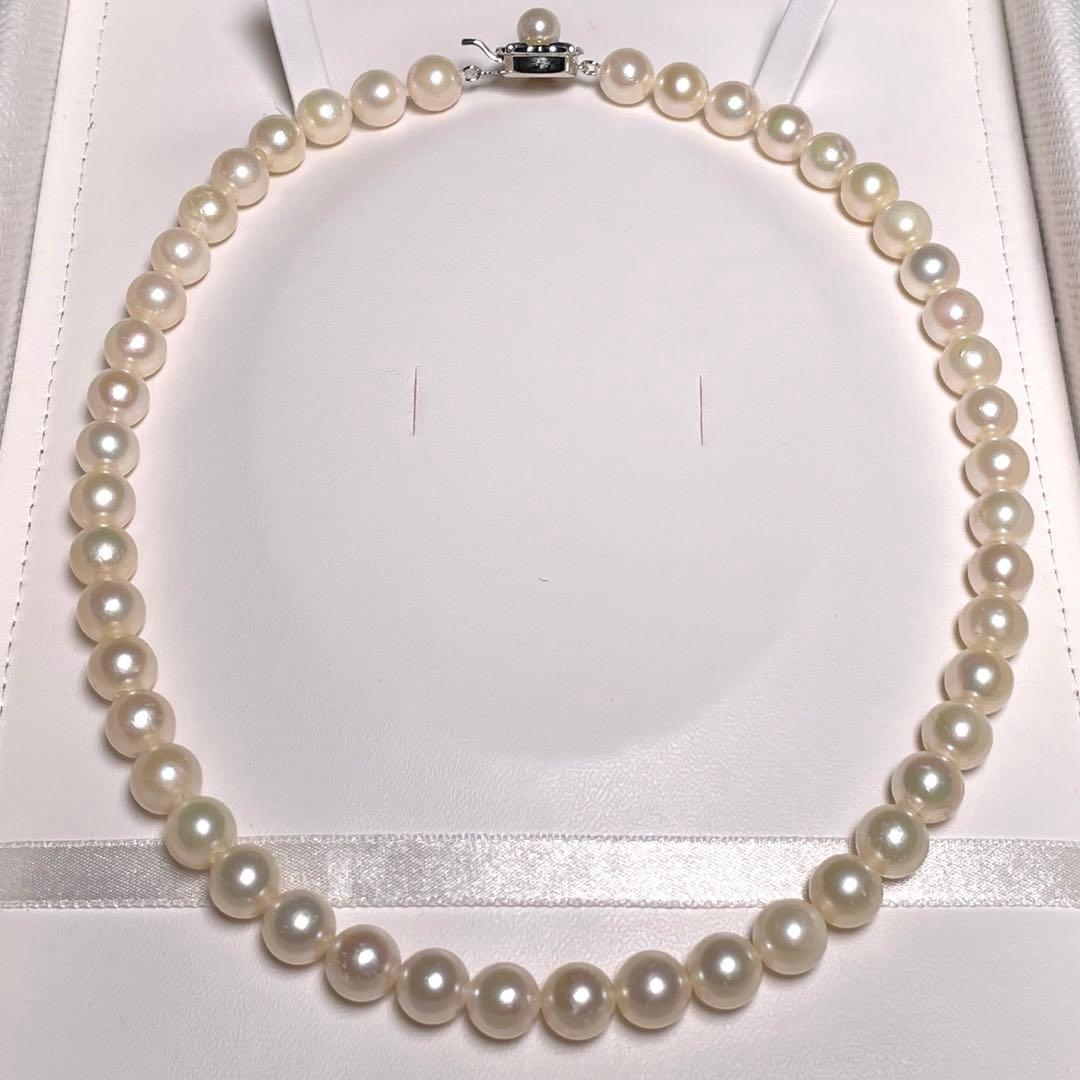 Akoya pearl necklace featuring round white pearls sized 8.5 to 8.8 mm on a 17-inch silver chain