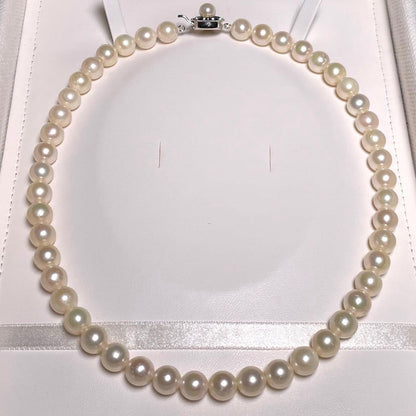 Akoya pearl necklace featuring round white pearls sized 8.5 to 8.8 mm on a 17-inch silver chain