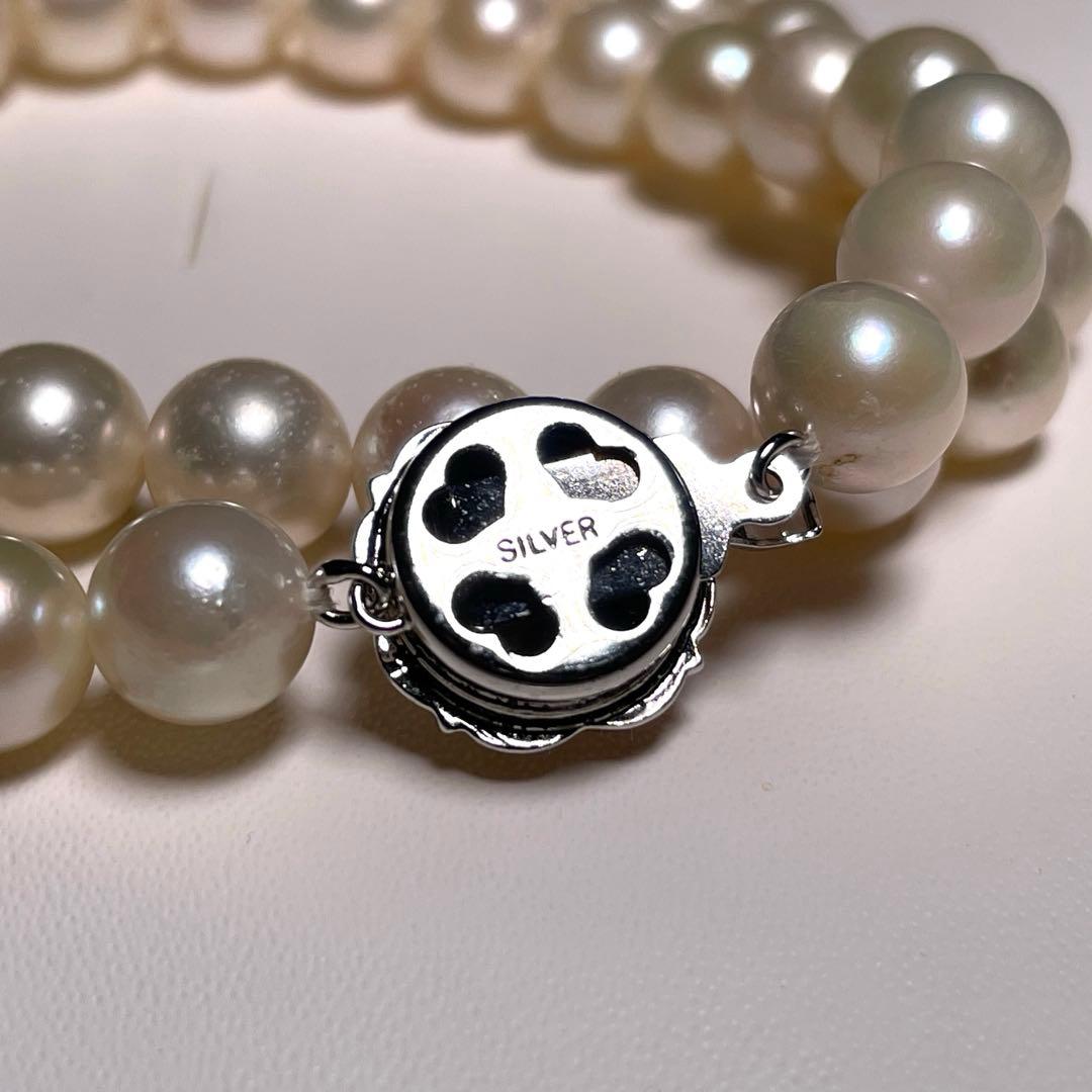 Akoya pearl necklace featuring round white pearls sized 8.5 to 8.8 mm on a 17-inch silver chain