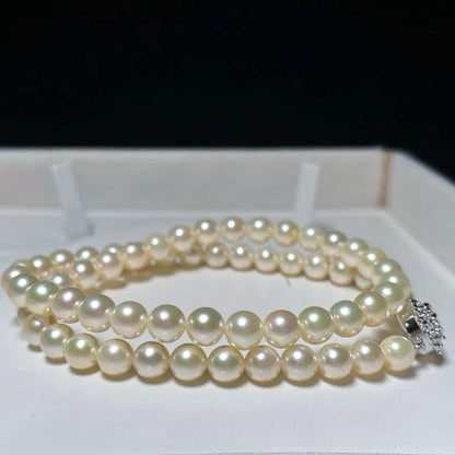 Aqua Pearl Necklace featuring round 6.5~7.0mm Akoya pearls on a 42cm silver chain, white color, elegant design