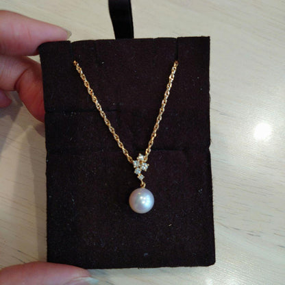 TASAKI Pearl Necklace featuring 8mm pearl, 18K gold chain, and diamond accents, approximately 40cm long