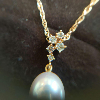 TASAKI Pearl Necklace featuring 8mm pearl, 18K gold chain, and diamond accents, approximately 40cm long