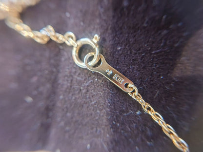 TASAKI Pearl Necklace featuring 8mm pearl, 18K gold chain, and diamond accents, approximately 40cm long