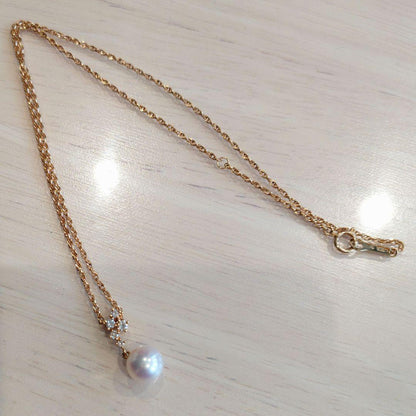TASAKI Pearl Necklace featuring 8mm pearl, 18K gold chain, and diamond accents, approximately 40cm long