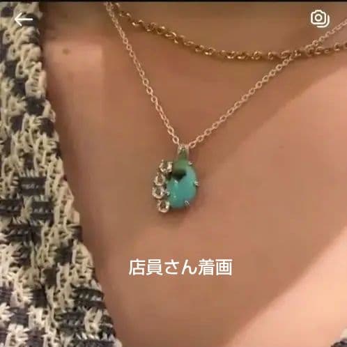 Agete silver necklace with turquoise stone and clear white topaz decorations on a delicate chain
