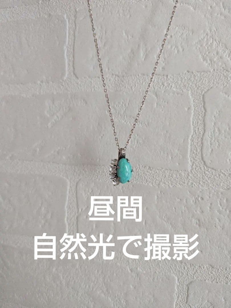 Agete silver necklace with turquoise stone and clear white topaz decorations on a delicate chain
