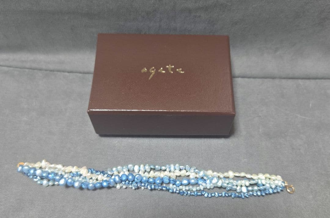 ageté K10 3-piece set with blue and white freshwater pearl necklace, bracelet, and earrings made of stone