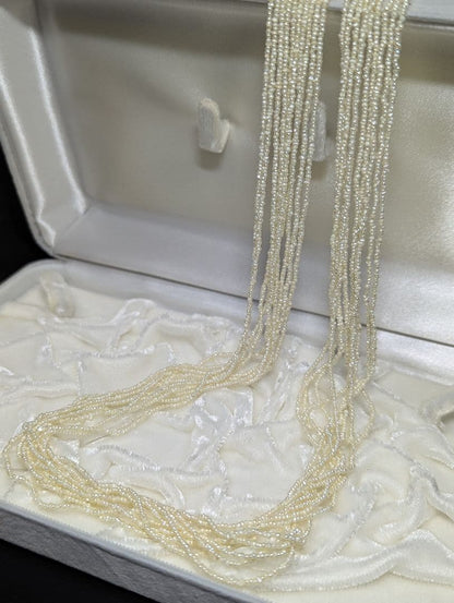 N105 K14WG 54cm 10-row Akoya pearls bead necklace with 1-2mm small sand pendulum pearls
