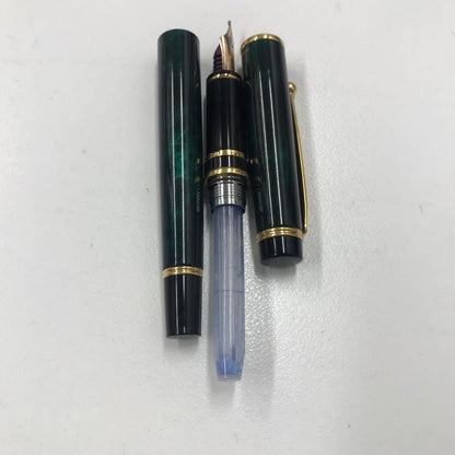 Pilot Fountain Pen model 14K-585 with green marble body and 14K gold nib shown as pictured
