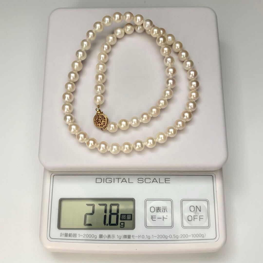 Akoya pearl necklace with 7.0mm white natural pearls on 43cm chain featuring 14KG clasp and strong luster