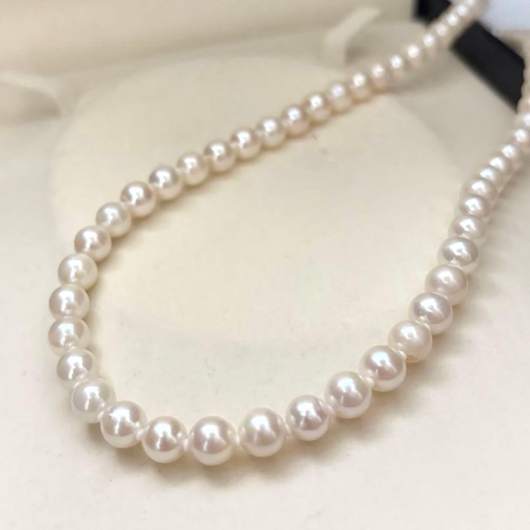 Akoya pearl necklace with 7.0mm white natural pearls on 43cm chain featuring 14KG clasp and strong luster