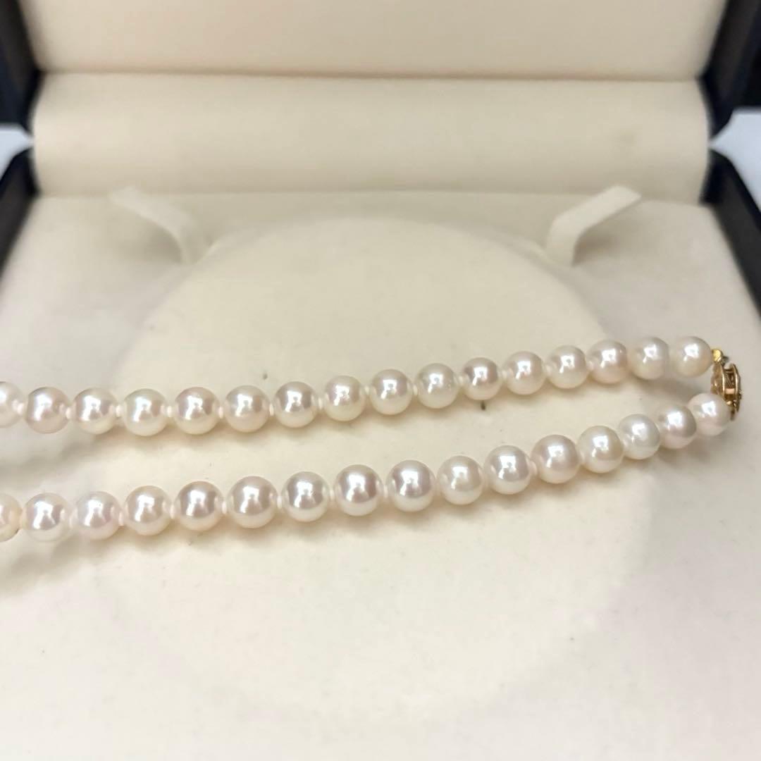 Akoya pearl necklace with 7.0mm white natural pearls on 43cm chain featuring 14KG clasp and strong luster