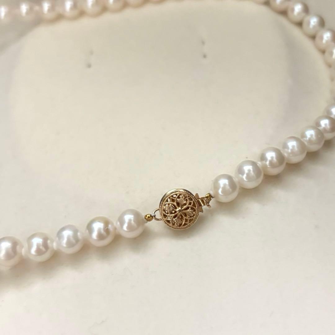 Akoya pearl necklace with 7.0mm white natural pearls on 43cm chain featuring 14KG clasp and strong luster