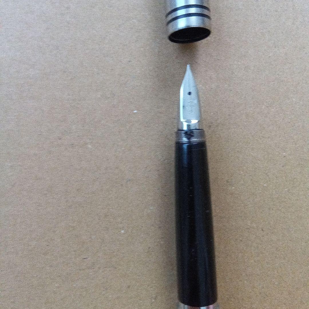 Vintage Pilot fountain pen over 40 years old with black barrel and silver trim