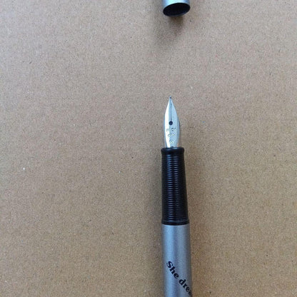 Vintage Pilot fountain pen over 40 years old with black barrel and silver trim