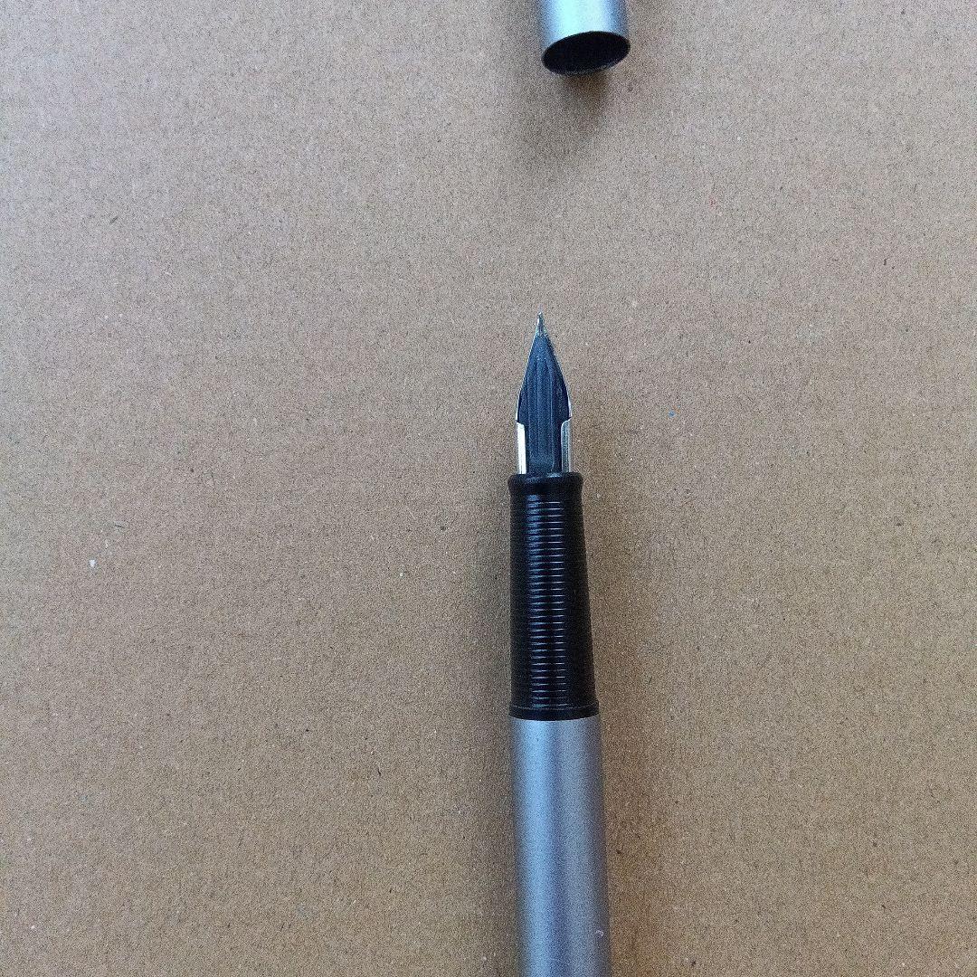 Vintage Pilot fountain pen over 40 years old with black barrel and silver trim