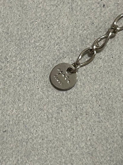 Agot Necklace with a distinctive stone pendant on a fine chain