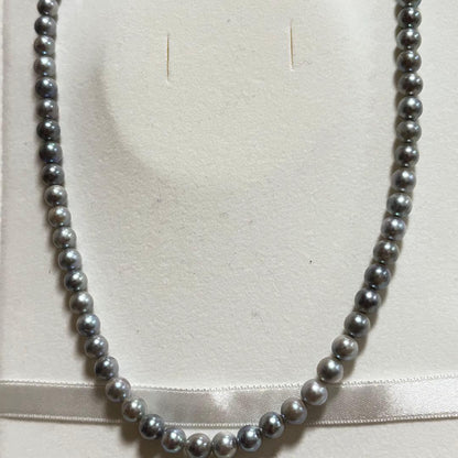 Akoya pearl necklace featuring 6-7mm pearls with a silver lock clasp, 42 cm long