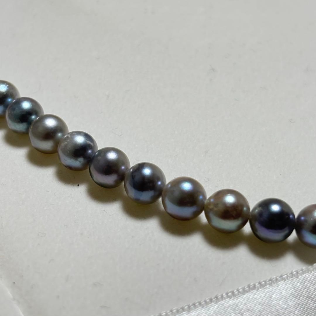 Akoya pearl necklace featuring 6-7mm pearls with a silver lock clasp, 42 cm long