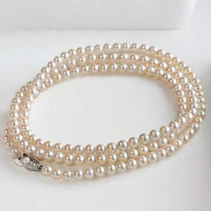 Takatsuki Maki Pearls Long Akoya Necklace with round 6.3-5.8mm pearls and silver clasp on 92cm chain