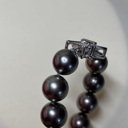 Tasaki Black Pearl Necklace featuring 9.0-11.0 mm pearls with a 41 cm length