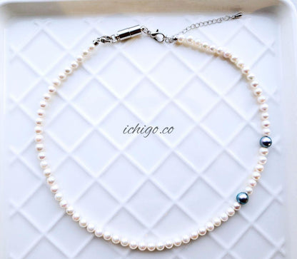 Akoya baby pearl necklace with 4mm white pearls and blue Akoya pearl necklace with 5mm deep blue pearls