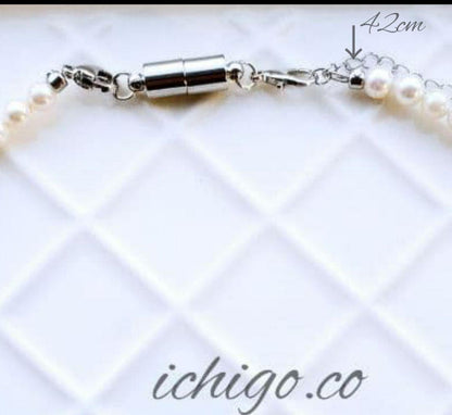 Akoya baby pearl necklace with 4mm white pearls and blue Akoya pearl necklace with 5mm deep blue pearls
