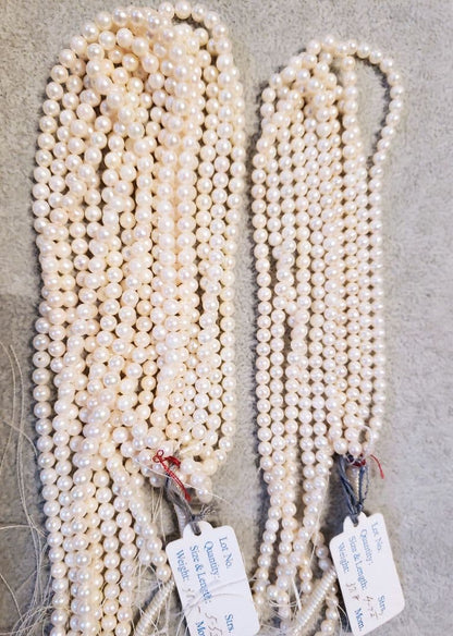 Akoya baby pearl necklace with 4mm white pearls and blue Akoya pearl necklace with 5mm deep blue pearls