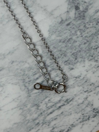 TASKA 7.1mm Akoya pearl necklace with silver mark on 40cm chain displayed on white background