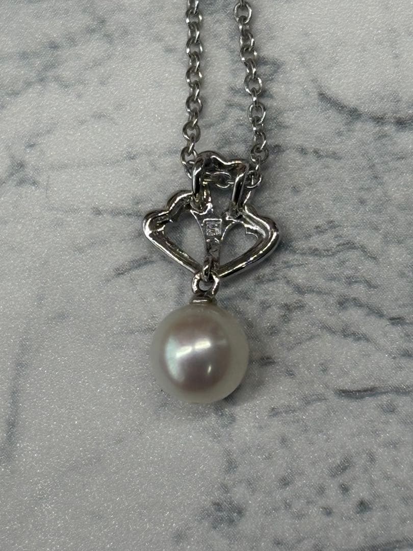TASKA 7.1mm Akoya pearl necklace with silver mark on 40cm chain displayed on white background
