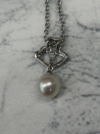 TASKA 7.1mm Akoya pearl necklace with silver mark on 40cm chain displayed on white background