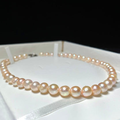 Akoya pearl necklace with large 8.0-9.0mm white semi-round pearls on silver chain 42.5 cm length