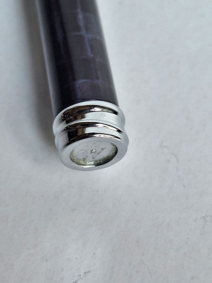 Waterman ballpoint pen with blue and black marble pattern and simple clip on metal and plastic body