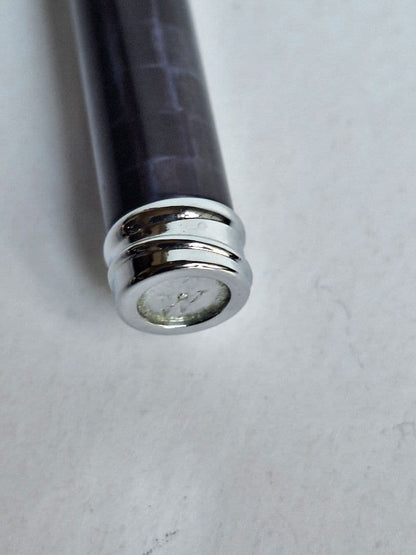Waterman ballpoint pen with blue and black marble pattern and simple clip on metal and plastic body